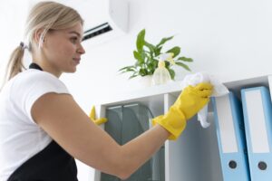 person-taking-care-office-cleaning-3-min